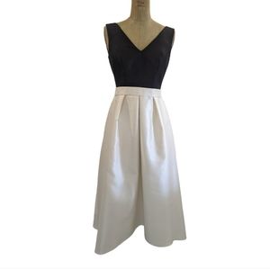 Alfred Sung Black and white formal Dress size 2. Side pockets and belt.